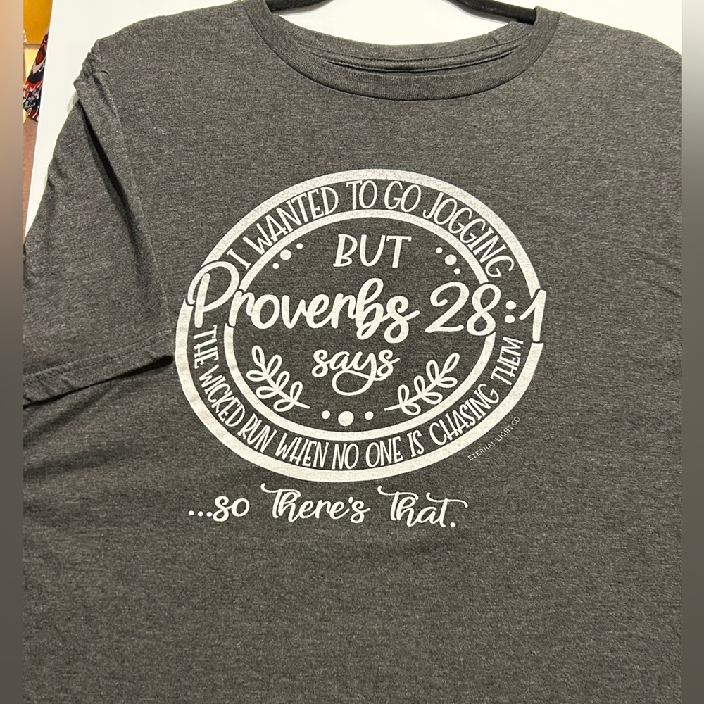 WOMEN’S CHRISTIAN T-SHIRT, UNISEX SIZE XL; NO STAINS OR FLAWS OF ANY KIND NOTED.